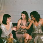 3 girlfriends drinking at Christmas party