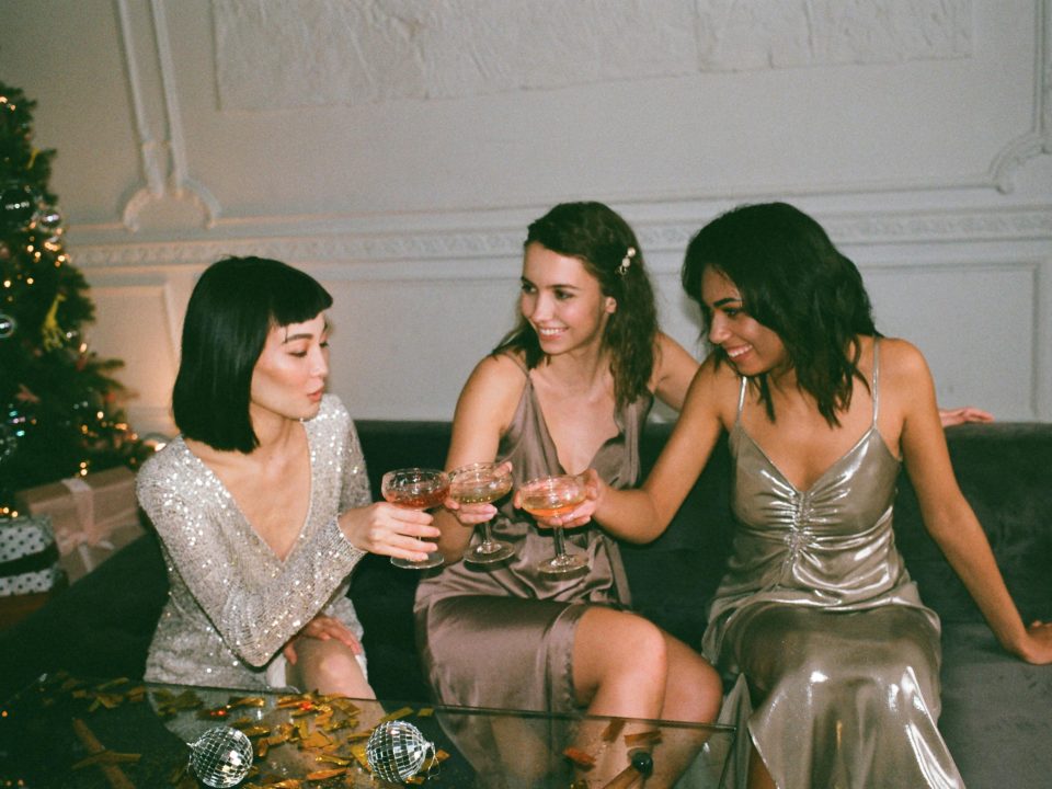 3 girlfriends drinking at Christmas party