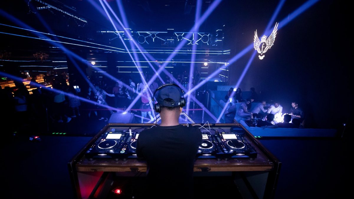 a dj playing in a venue